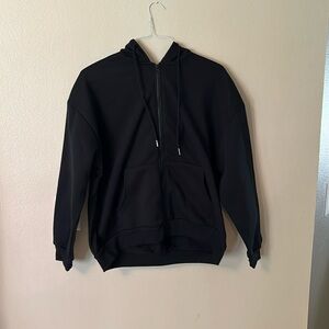 Black zip up. Never worn